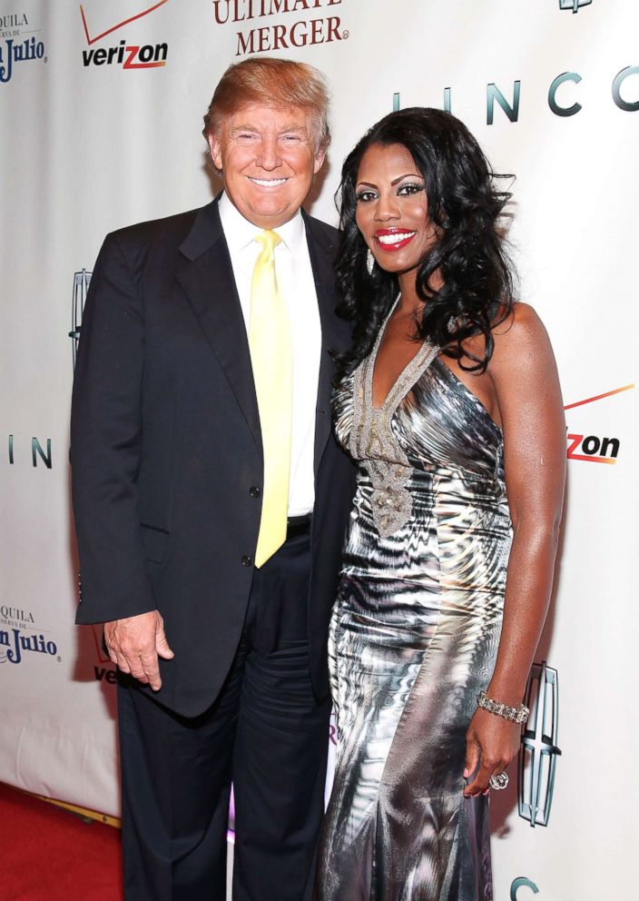 PHOTO: Donald Trump and Omarosa attend "The Ultimate Merger" premiere at Trump Tower on June 14, 2010 in New York City.