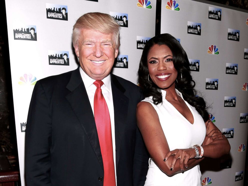 PHOTO: Donald Trump and actress Omarosa Manigault attend the "All-Star Celebrity Apprentice" Red Carpet Event at Trump Tower on April 1, 2013, in New York City.