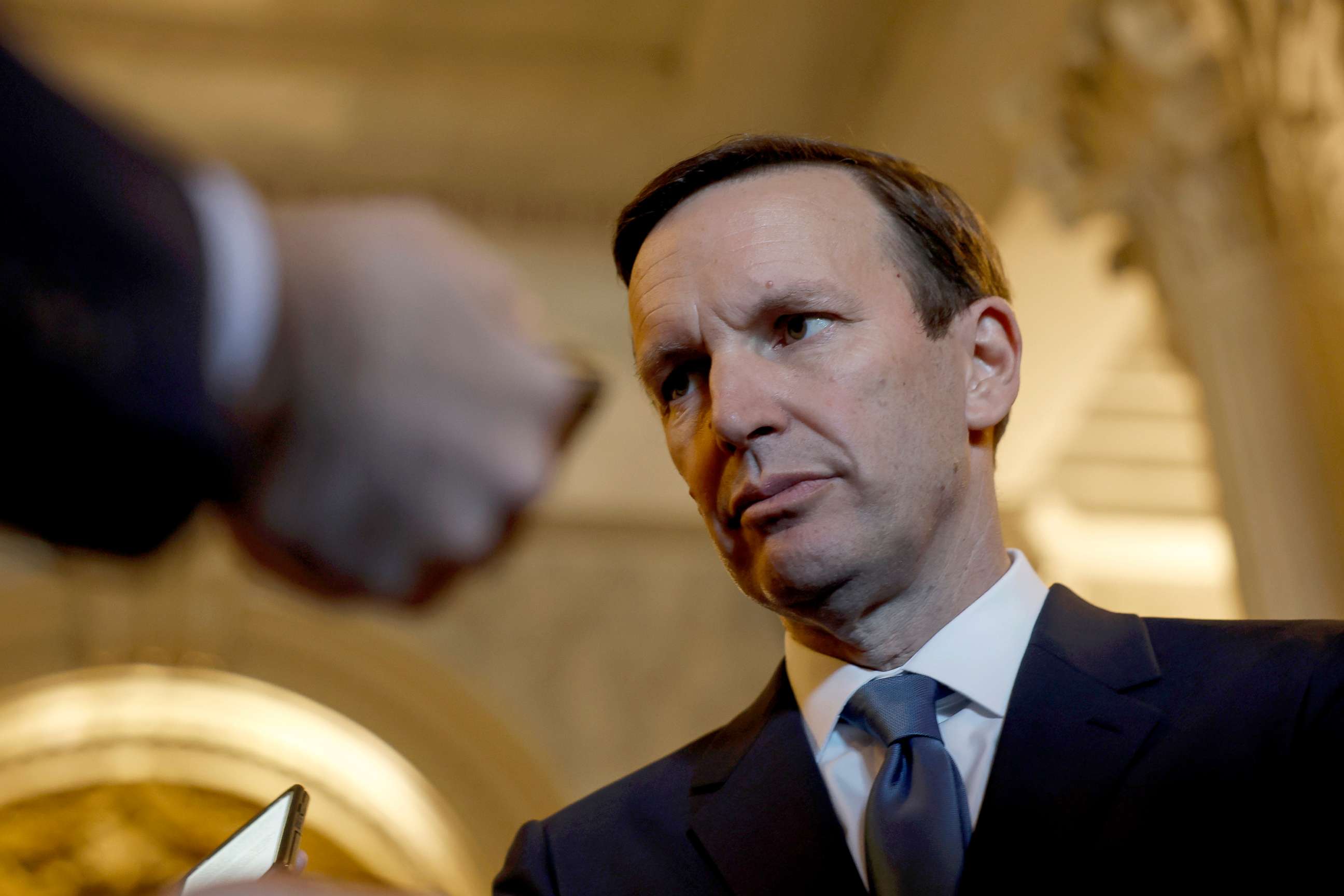PHOTO: Sen. Chris Murphy speaks to reporters outside of the Senate Chambers of the U.S. Capitol in Washington, June 21, 2022.