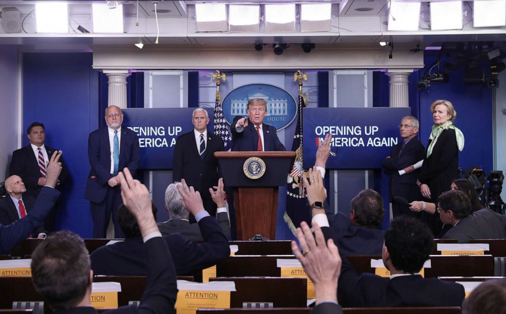 PHOTO: President Donald Trump answers questions during an announcement of the Trump administration's guidelines for "Opening Up America Again" at the daily coronavirus task force briefing at the White House in Washington, April 16, 2020.