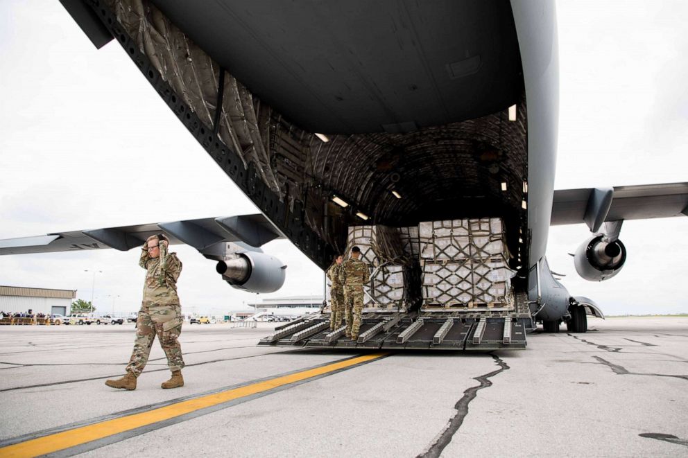 PHOTO: Pallets of Nestle Health Science Alfamino Infant and Alfamino Junior formula sent in through Operation Fly Formula are unloaded from a US military aircraft at Indianapolis International Airport in Indianapolis, Indiana, on May 22, 2022.