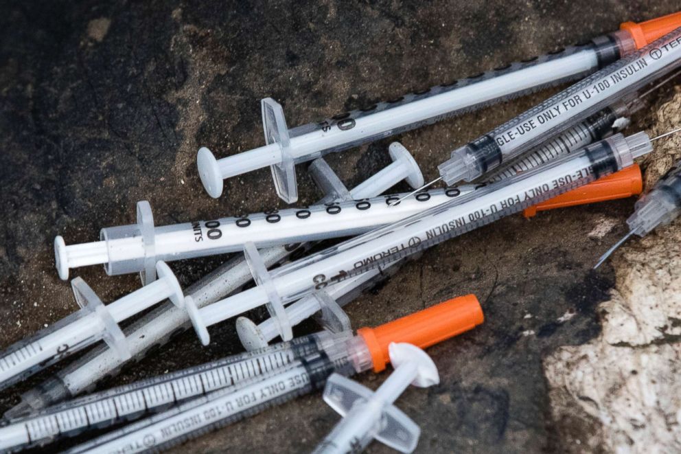 PHOTO: Discarded syringes are seen in an open-air heroin market slated for cleanup in Philadelphia, July 31, 2017.