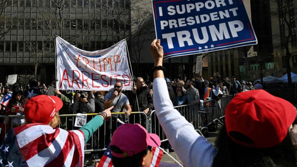 PHOTO: Supporters of former President Donald Trump argue with opponents outside the Manhattan District Attorney's office in New York City on April 4, 2023, ahead of Trump's expected appearance before a New York judge to answer criminal charges.