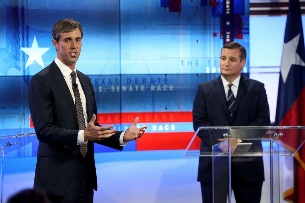 PHOTO: Rep. Beto O'Rourke speaks, as Senator Ted Cruz looks on, during a debate at the KENS-5 Studios in San Antonio, Texas, Oct. 16, 2018.