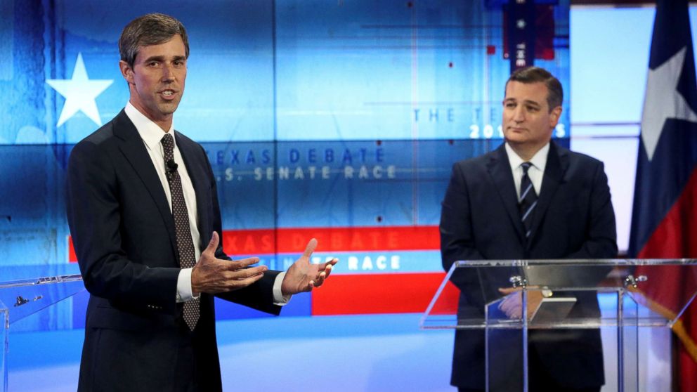 PHOTO: Rep. Beto O'Rourke speaks, as Senator Ted Cruz looks on, during a debate at the KENS-5 Studios in San Antonio, Texas, Oct. 16, 2018.