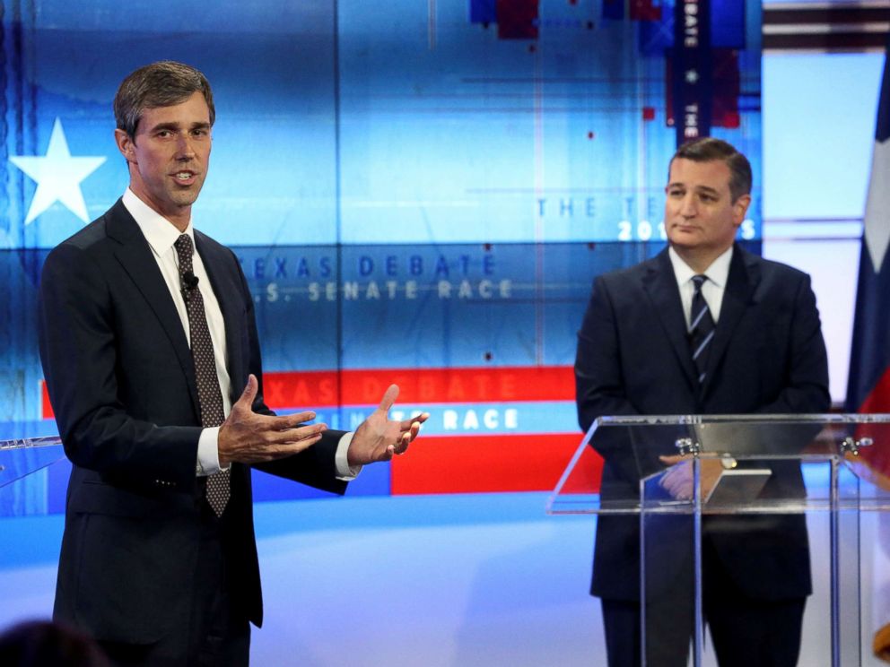 PHOTO: Rep. Beto ORourke speaks, as Senator Ted Cruz looks on, during a debate at the KENS-5 Studios in San Antonio, Texas, Oct. 16, 2018.