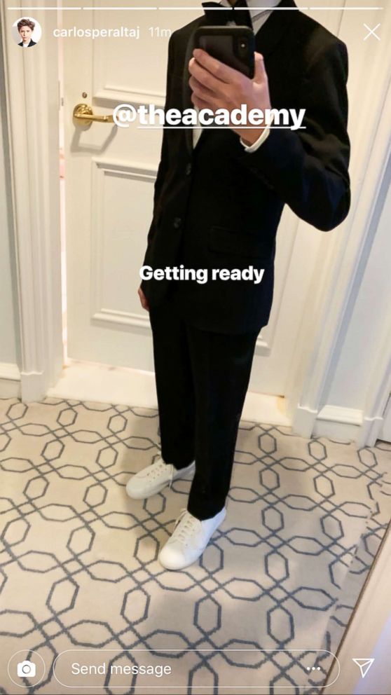PHOTO: Carlos Peralta is Oscars ready with a suit and sneakers.