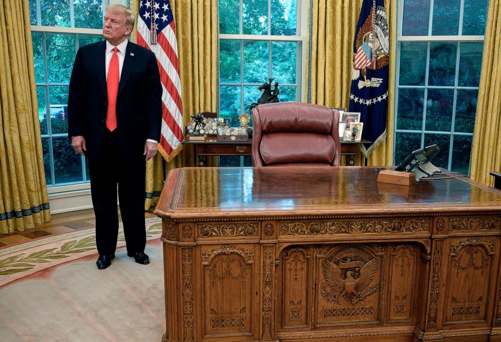 PHOTO: President Donald Trump stands in the Oval Office, Sept. 5, 2019, next to the HMS Resolute desk with a replica of the equestrian statue of Andrew Jackson by Clark Mills, behind his chair.