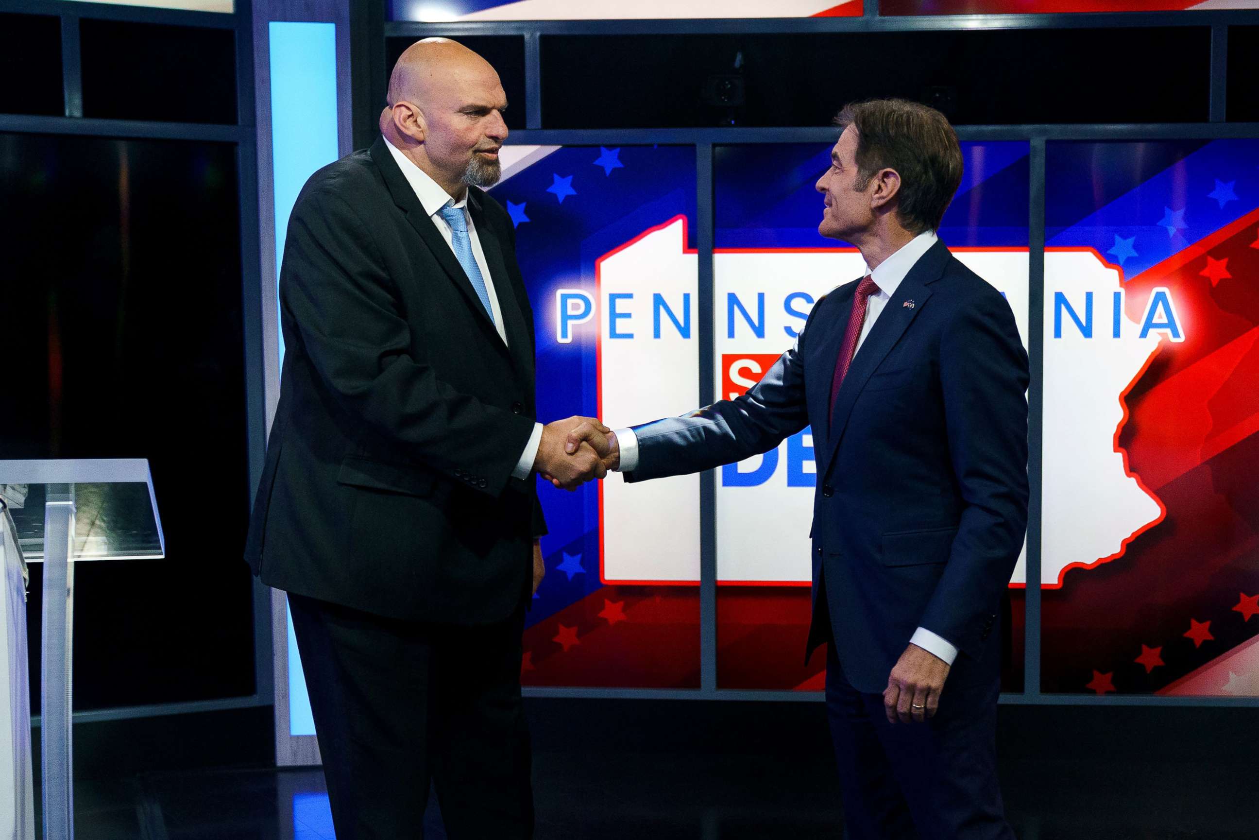 PHOTO: A handout photo made available by abc27 shows Democratic candidate Lt. Gov. John Fetterman (L) and Republican Pennsylvania Senate candidate Dr. Mehmet Oz (R) shaking hands prior to their debate in Harrisburg, Penn., Oct. 25, 2022.