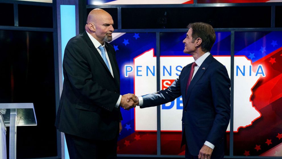 PHOTO: A handout photo made available by abc27 shows Democratic candidate Lt. Gov. John Fetterman (L) and Republican Pennsylvania Senate candidate Dr. Mehmet Oz (R) shaking hands prior to their debate in Harrisburg, Penn., Oct. 25, 2022 .