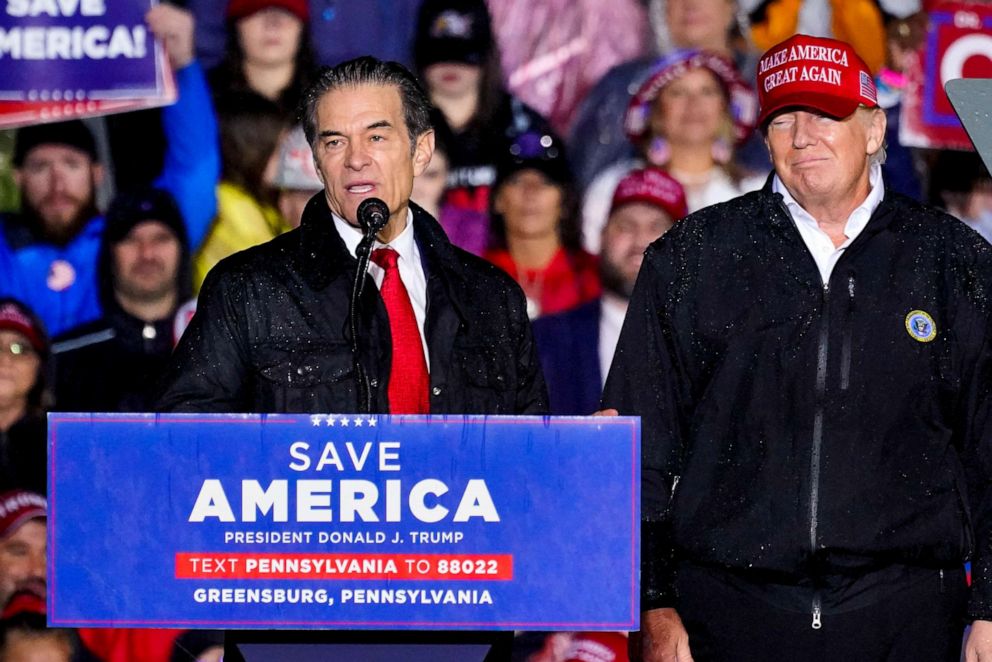 PHOTO: Pennsylvania Senate candidate Dr. Mehmet Oz, accompanied by former President Donald Trump, speaks at a campaign rally in Greensburg, Pa., May 6, 2022.