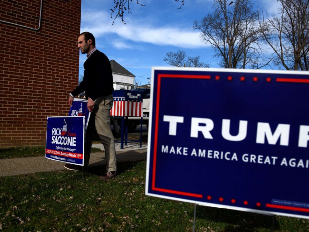 PHOTO: A volunteer places campaign signs for Republican congressional candidate Rick Saccone outside the VFW Post 4793, March 5, 2018 in Waynesburg, Pa. Saccone is running in a tight race for the vacated seat of Congressman Tim Murphy against Conor Lamb.