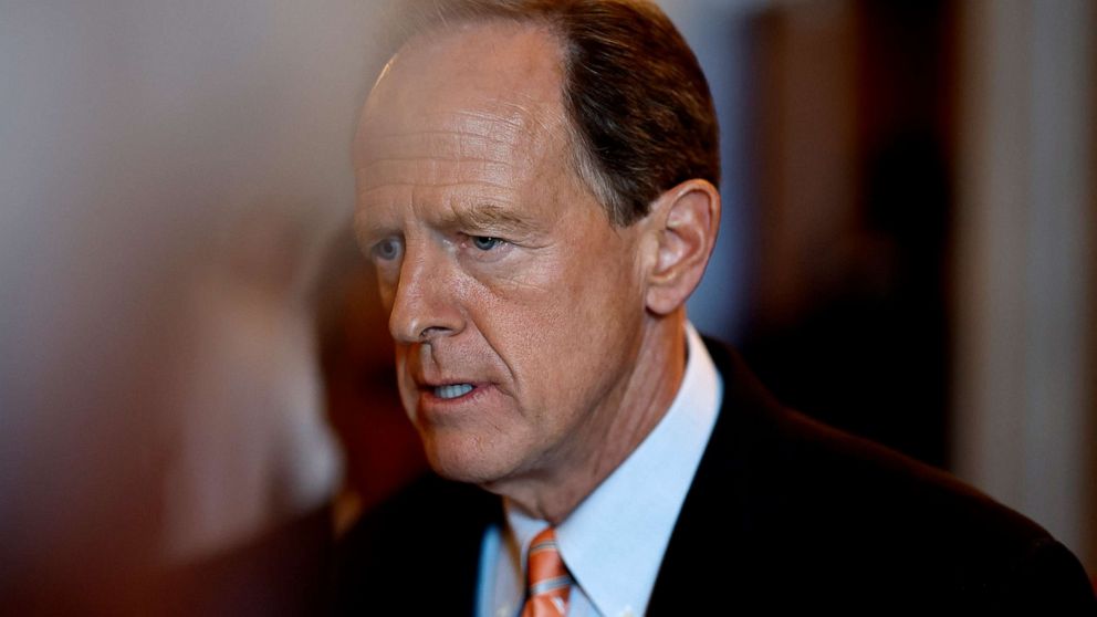 PHOTO: Sen. Pat Toomey  walks out of the Senate Chambers during a nomination vote in the U.S. Capitol Building in Washington, Aug. 1, 2022. 