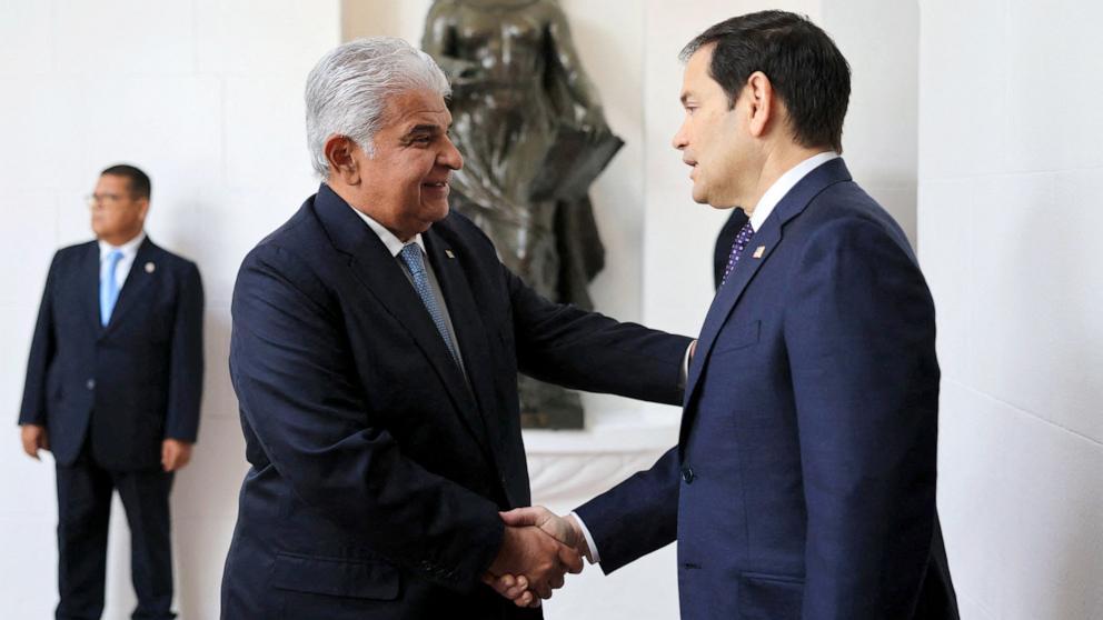 PHOTO: Handout picture released by Panama's Presidency press office showing Panama's President Jose Raul Mulino (L) greeting US Secretary of State Marco Rubio on arrival at the presidential palace in Panama City on Feb. 2, 2025.