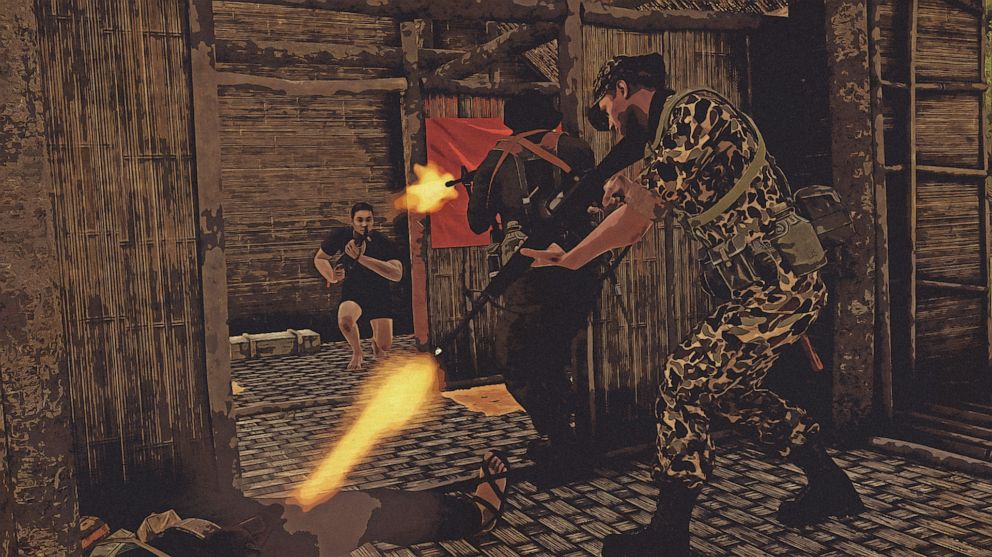 PHOTO: Davis leads assault in the early morning at Bong Song, clearing an enemy headquarters hut. He is wounded in the forearm.