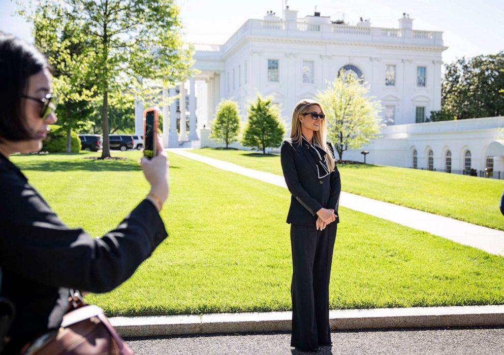 PHOTO: Paris Hilton stands outside the White House on May 10, 2022, in Washington, D.C. Hilton and her husband Carter Reum visited the White House to meet with Biden administration officials regarding child abuse laws.