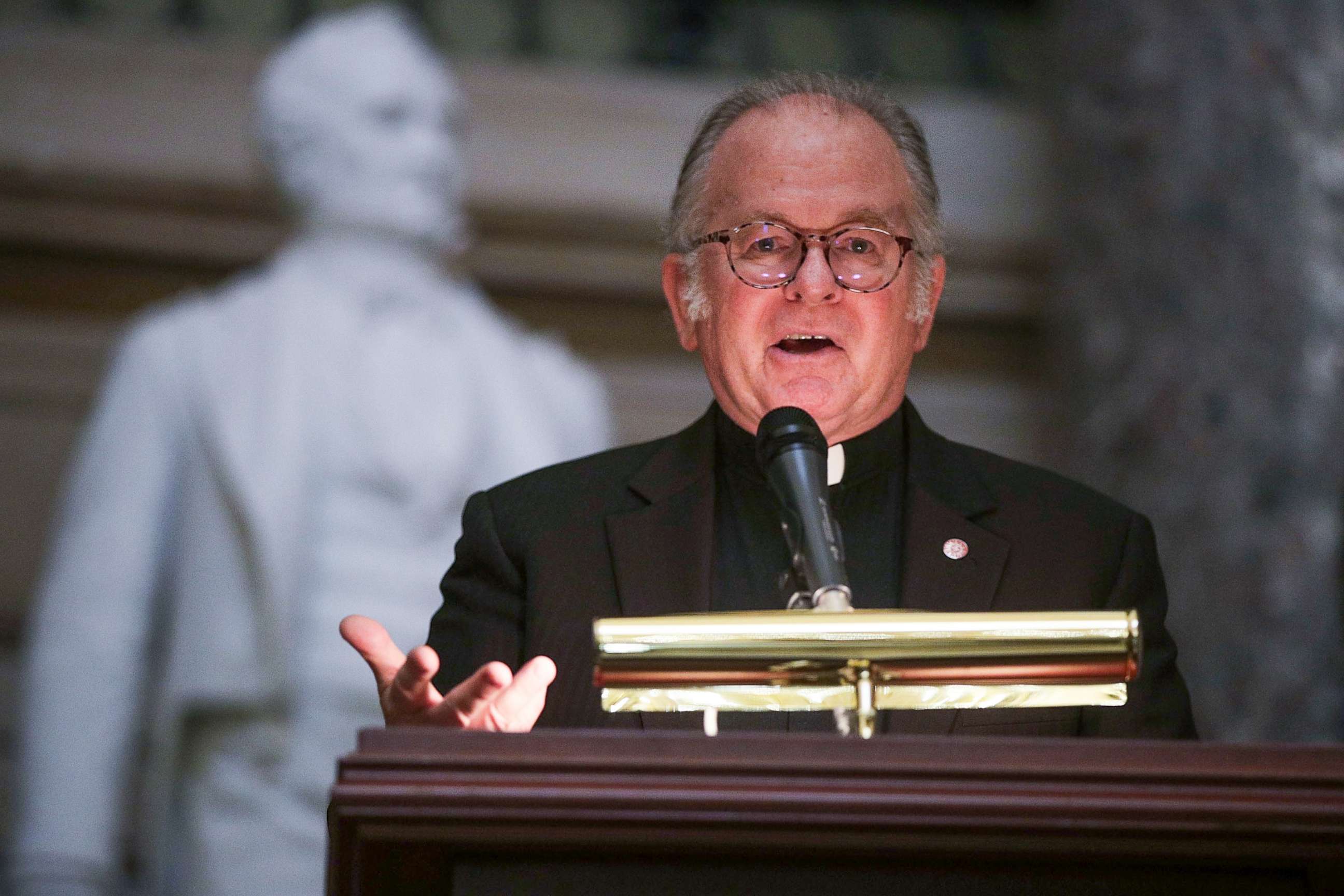 PHOTO: Father Patrick Conroy speaks during a memorial service at the National Statuary Hall of the Capitol Sept. 27, 2017, in Washington.