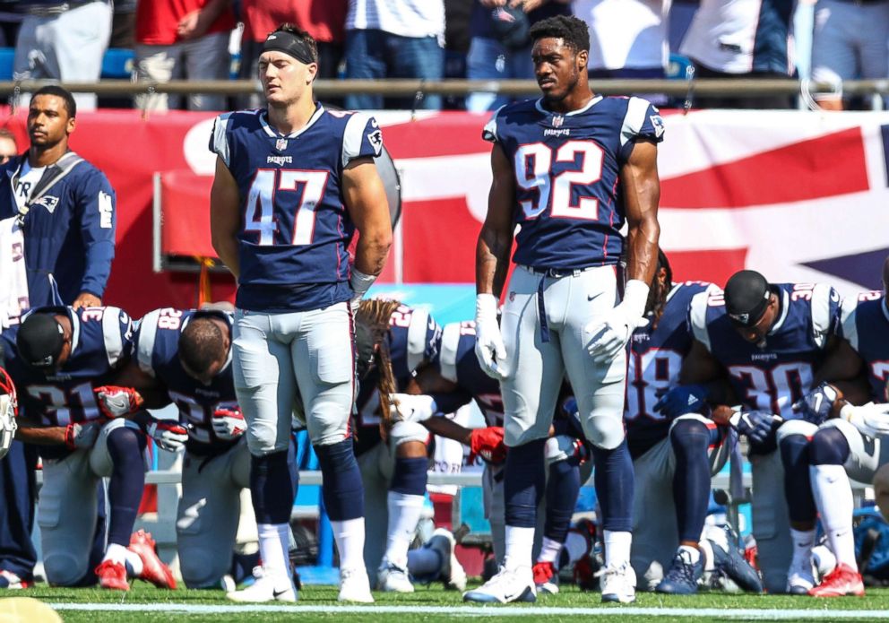 PHOTO: Members of the New England Patriots kneel on the sidelines during the National Anthem before a game against the Houston Texans at Gillette Stadium on Sept.24, 2017n in Foxboro, Mass.