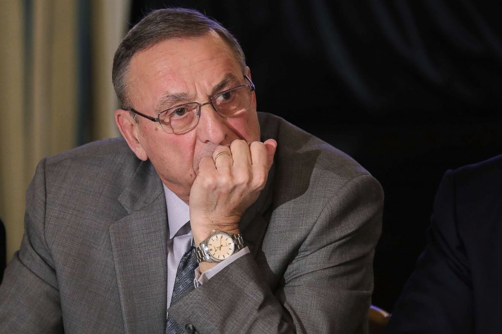 PHOTO: Maine Governor Paul LePage listens to President Donald Trump during meeting with state and local officials in the State Dining Room at the White House, Feb. 12, 2018