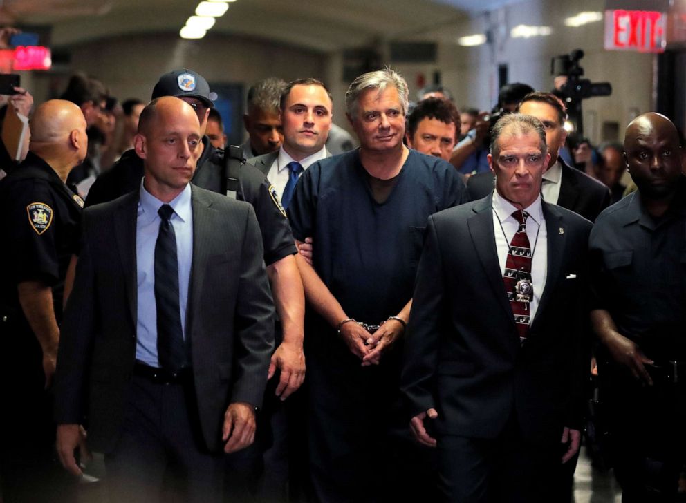 PHOTO: Former Trump campaign chairman Paul Manafort, is escorted into court during his arraignment in New York Supreme Court in New York, June 27, 2019.