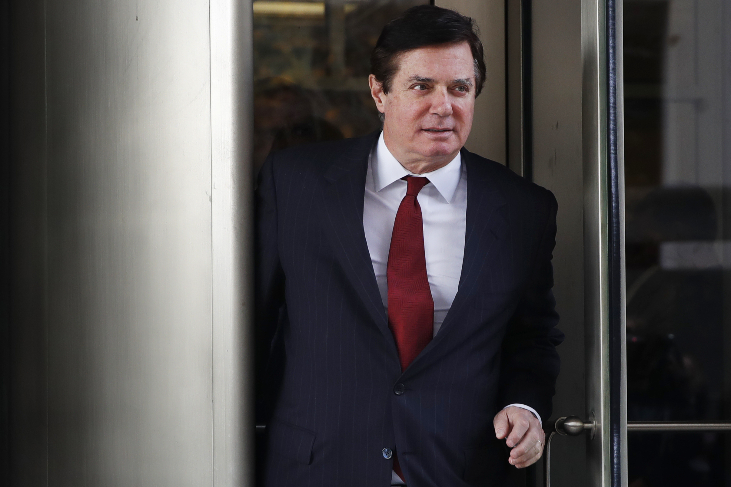 Paul Manafort, President Donald Trump's former campaign chairman, leaves the federal courthouse in Washington, Nov. 6, 2017. He has struggled to pay his bail of $10 million.