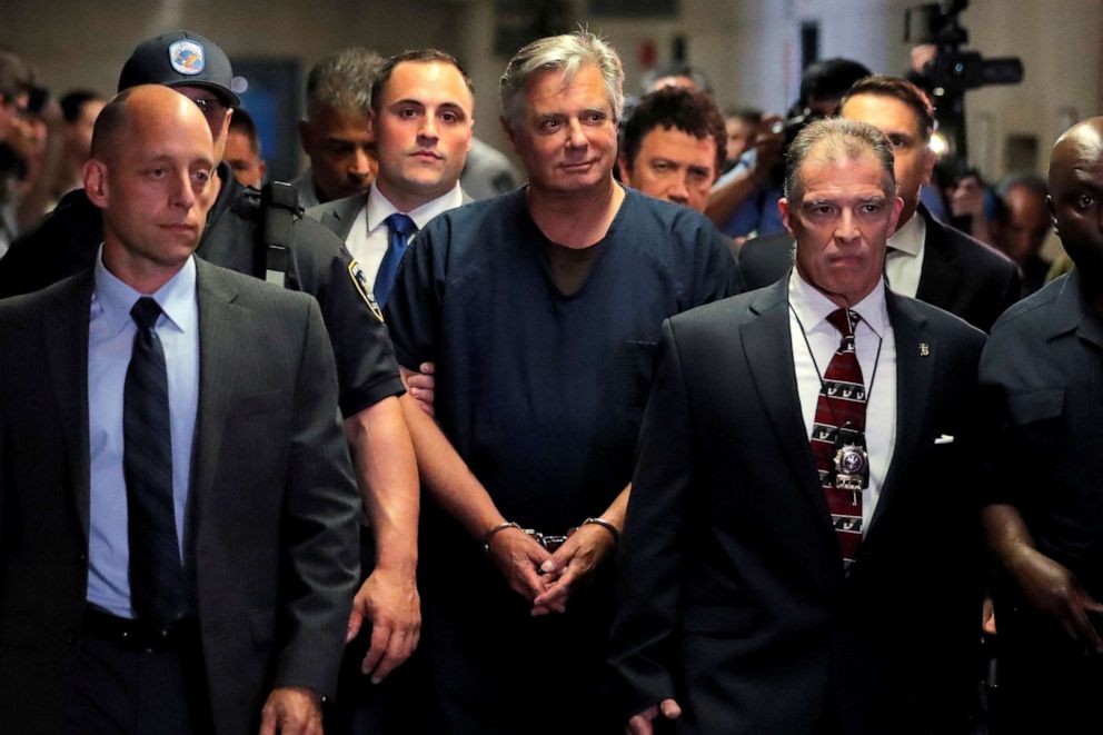 PHOTO: Former Trump campaign chairman Paul Manafort is escorted into court for his arraignment in New York Supreme Court in New York, June 27, 2019.