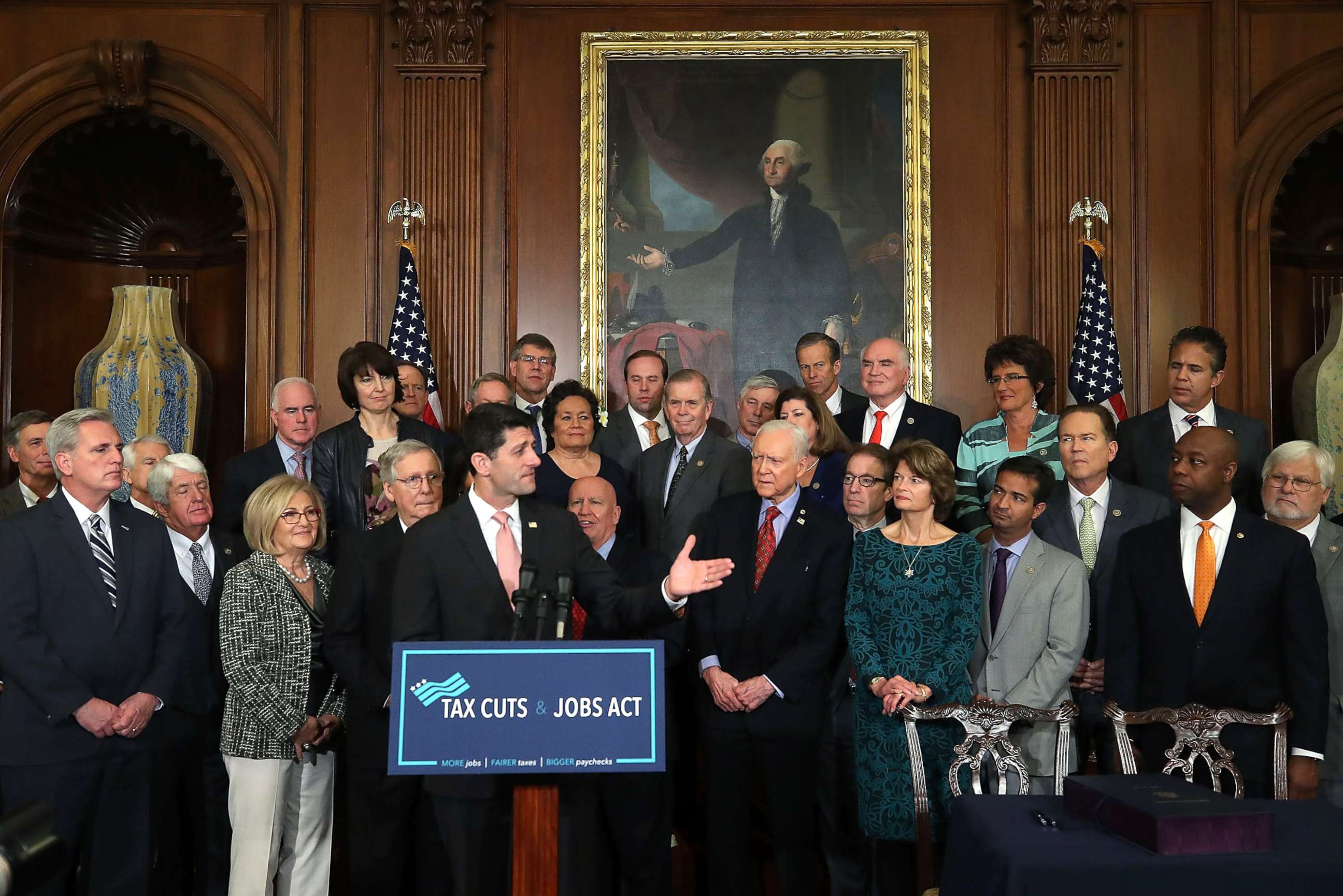 PHOTO: House Speaker Paul Ryan, flanked by Republican lawmakers, speaks during an enrollment ceremony for the conference report to H.R. 1, the Tax Cuts and Jobs Act. that was passed this week by the House and Senate, at the U.S. Capitol, Dec. 21, 2017.