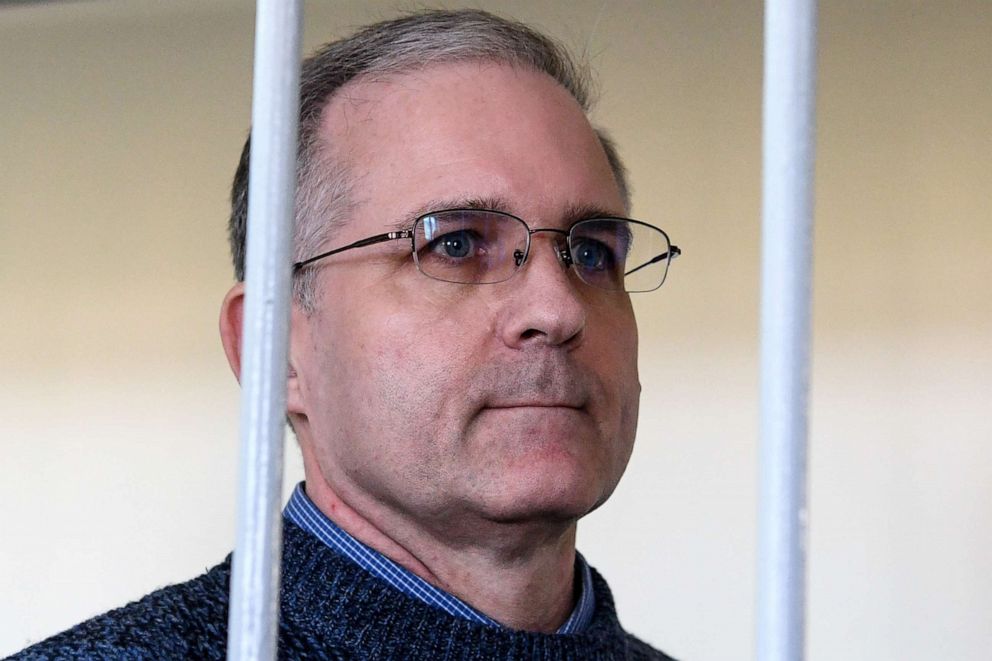 PHOTO: Paul Whelan, a former U.S. Marine, accused of spying and arrested in Russia, stands inside a defendants' cage during a hearing at a court in Moscow in this Aug. 23, 2019 file photo.