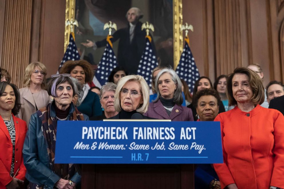 PHOTO: Lilly Ledbetter, center, an activist for workplace equality, is flanked by Speaker of the House Nancy Pelosi and Rep. Rosa DeLauro while she speaks at an event to advocate for the Paycheck Fairness Act at the Capitol in Washington, Jan. 30, 2019.