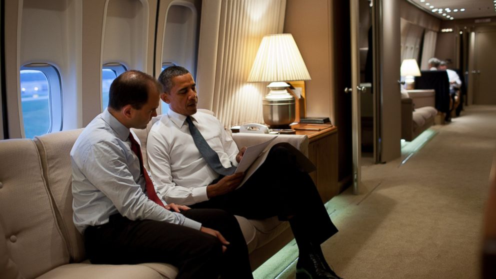 PHOTO: President Barack Obama talks with Ben Rhodes, Deputy National Security Advisor for Strategic Communications, aboard Air Force One en route to New York, N.Y., to commemorate the tenth anniversary of the 9/11 attacks against the United States. 