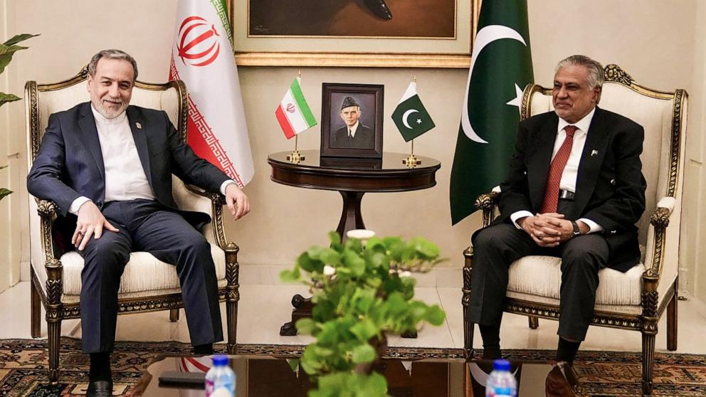 PHOTO: This handout photo released by the Iranian foreign ministry shows Pakistan's Foreign Minister Ishaq Dar (L) meeting his Iranian counterpart Abbas Araghchi upon his arrival in Islamabad , on April 24, 2026.
