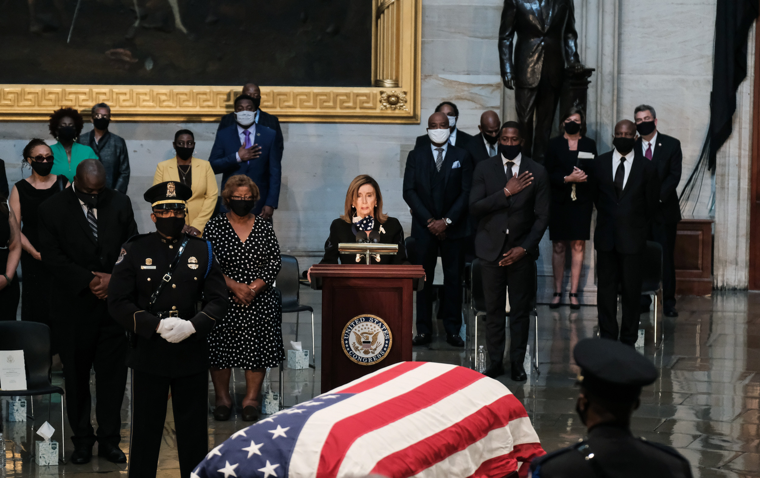 PHOTO: Speaker of the House Rep. Nancy Pelosi (D-CA) pays her respects as the  Rep. John Lewis (D-GA) lies in state at the Capitol Rotunda in Washington, D.C. July 27, 2020.