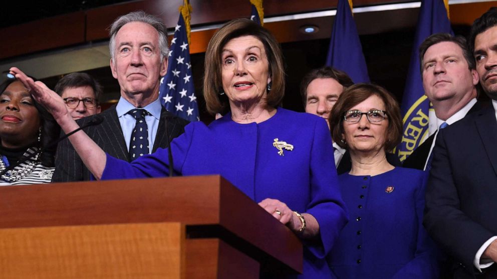 PHOTO: Speaker of the House Nancy Pelosi, center, speaks about the U.S. - Mexico - Canada Agreement, known as the USMCA, on Capitol Hill in Washington, Dec. 10, 2019.