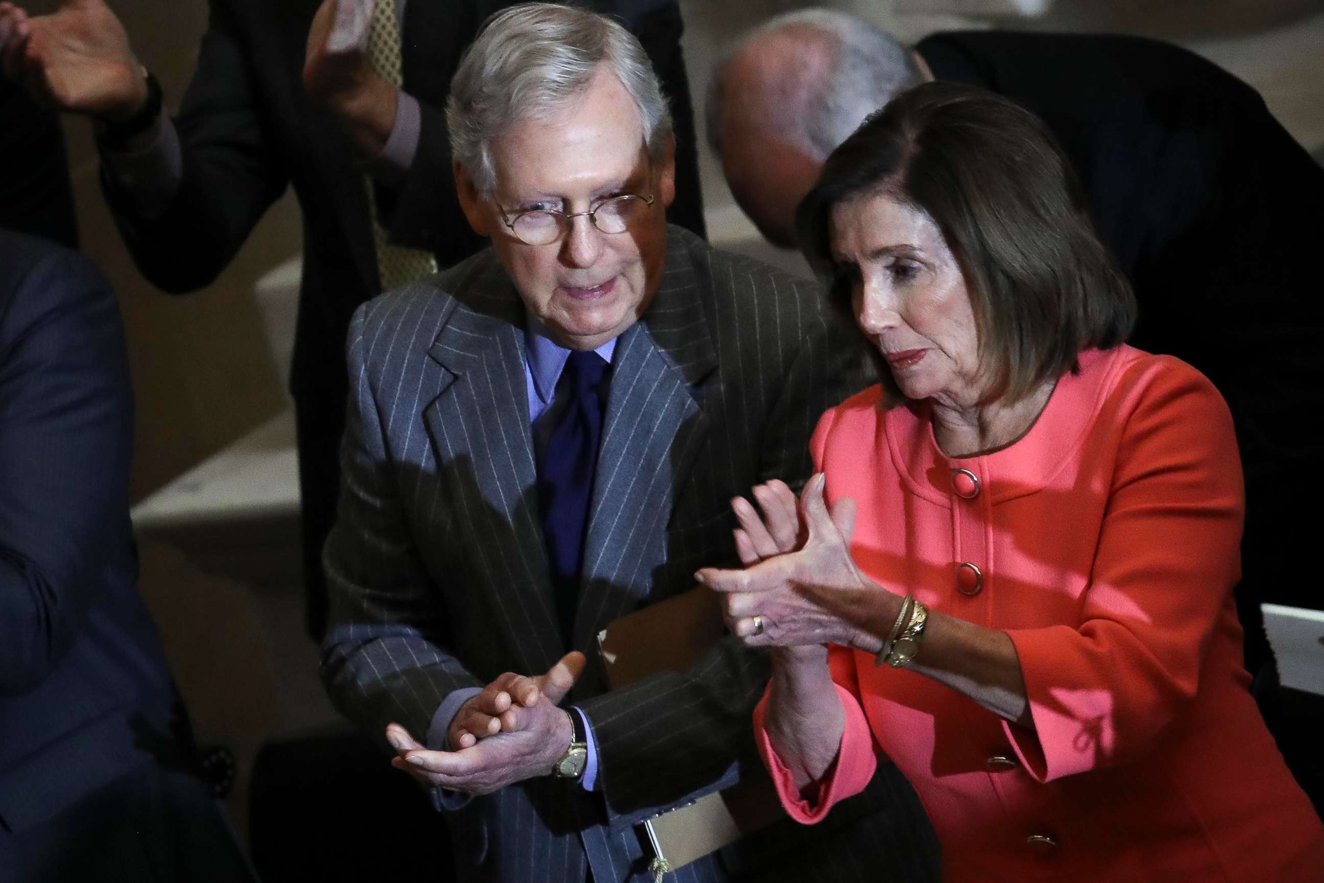 PHOTO: Speaker of the House Nancy Pelosi and Senate Majority Leader Mitch McConnell briefly speak with each other as they attend a Congressional Gold Medal ceremony at the Capitol, Jan. 15, 2020.