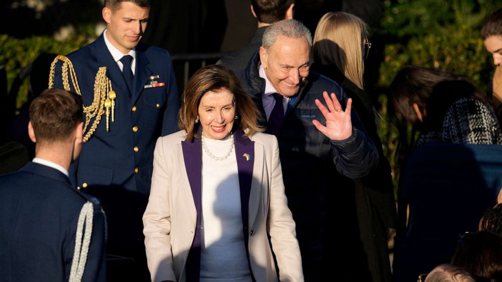  House Speaker Nancy Pelosi and Senate Majority Leader Chuck Schumer get  earlier  President Joe Biden speaks during a measure  signing ceremonial  for the Respect for Marriage Act, Dec. 13, 2022, connected  the South Lawn of the White House.