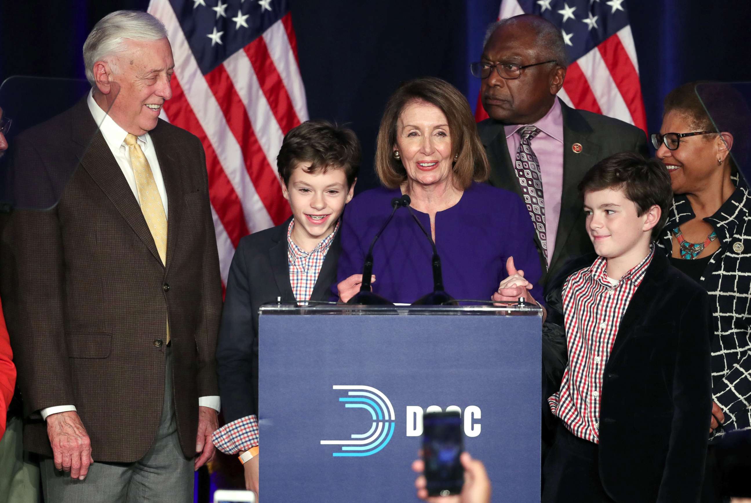 PHOTO: House minority leader Nancy Pelosi celebrates the Democrats winning a majority in the House of Representatives with minority whip Steny Hoyer, left, her grandsons and Rep. James Clyburn during an election night party in Washington, Nov. 6, 2018.