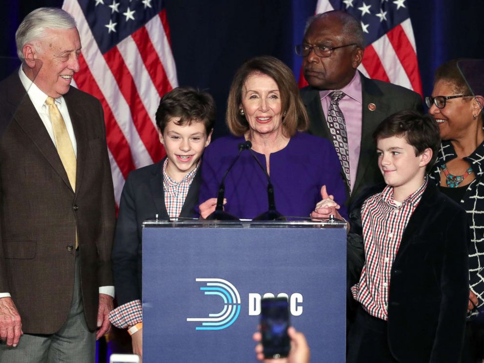 PHOTO: House minority leader Nancy Pelosi celebrates the Democrats winning a majority in the House of Representatives with minority whip Steny Hoyer, left, her grandsons and Rep. James Clyburn during an election night party in Washington, Nov. 6, 2018.