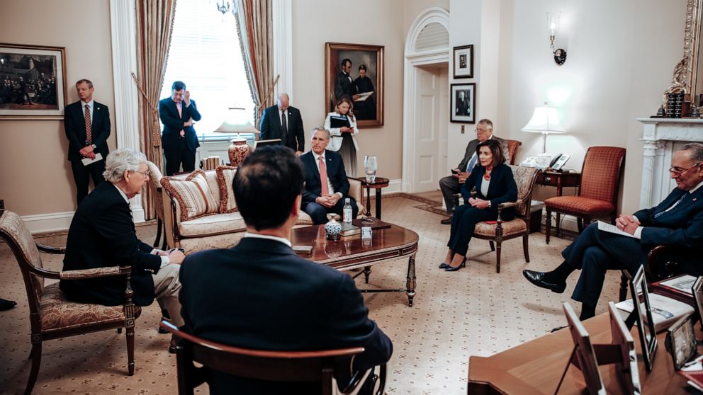 PHOTO: Senate Majority Leader Mitch McConnell hosted Speaker of the House Nancy Pelosi in his office to discuss the Coronavirus Aid, Relief, and Economic Security (CARES) Act, March 22, 2020. 