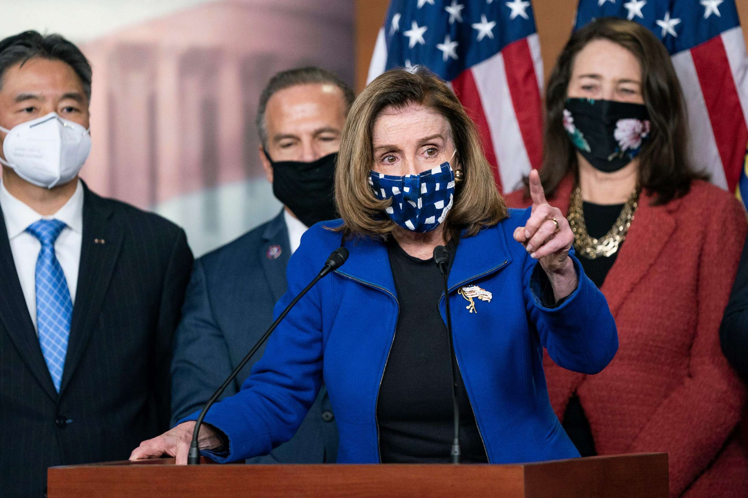 PHOTO: Speaker of the House Nancy Pelosi, with House impeachment managers, speaks to the press after the Senate voted to acquit former President Donald Trump, Feb. 13, 2021, at the U.S. Capitol in Washington, D.C.