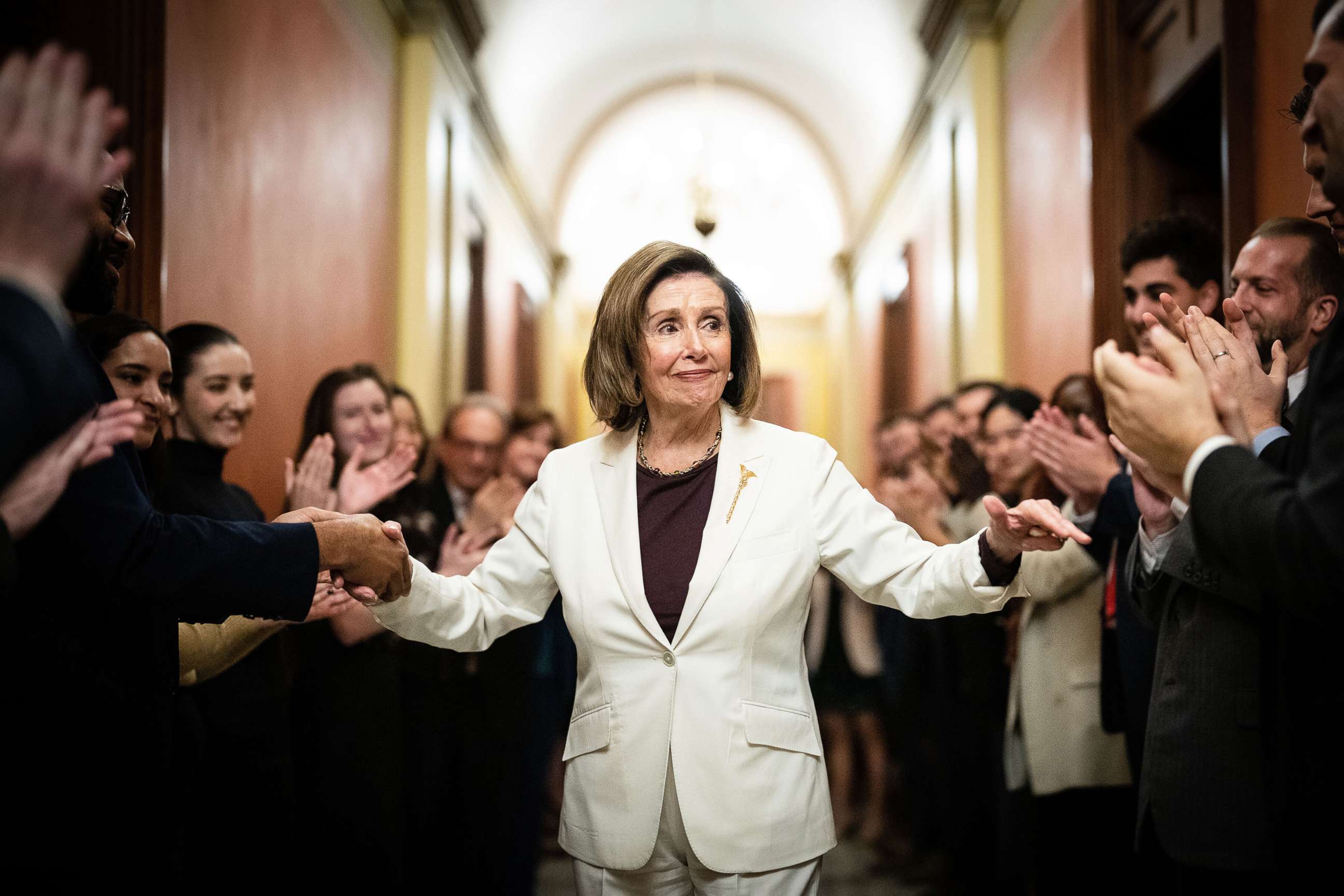 PHOTO: House Speaker Nancy Pelosi is greeted by staff after she announced that she would step down from her leadership position, on Capitol Hill in Washington, Nov. 17, 2022.