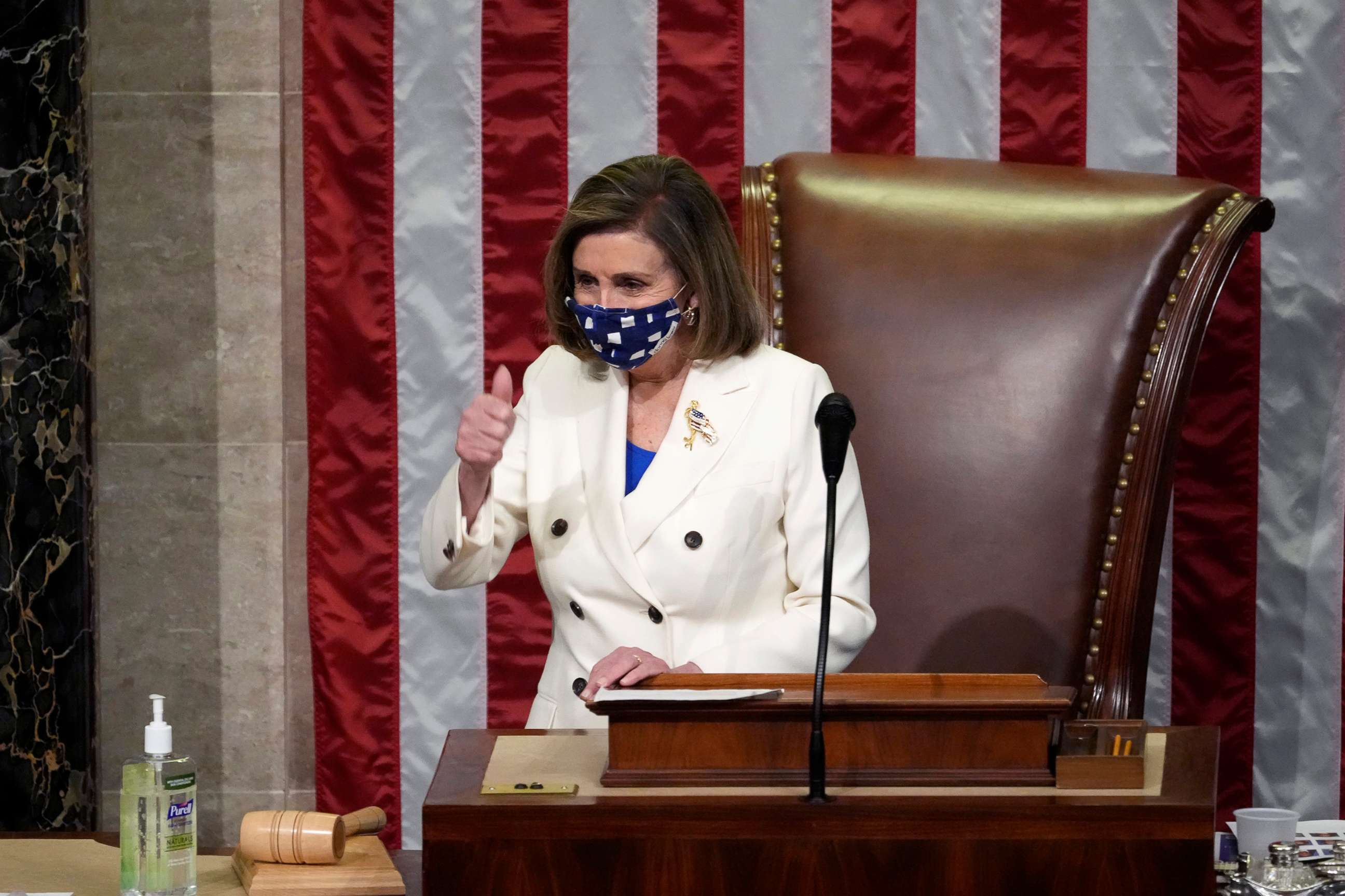 PHOTO: Speaker of the House Nancy Pelosi gives a thumbs up as she presides over voting on coronavirus relief package H.R. 1319 in the House Chamber of the U.S. Capitol, March 10, 2021, in Washington, D.C.