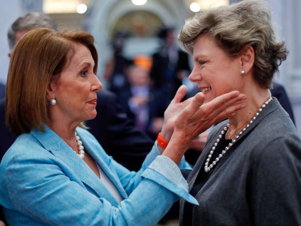 PHOTO: Nancy Pelosi, left, greets journalist Cokie Roberts in the Great Hall of the Library of Congress in Washington, Sept. 14, 2016.