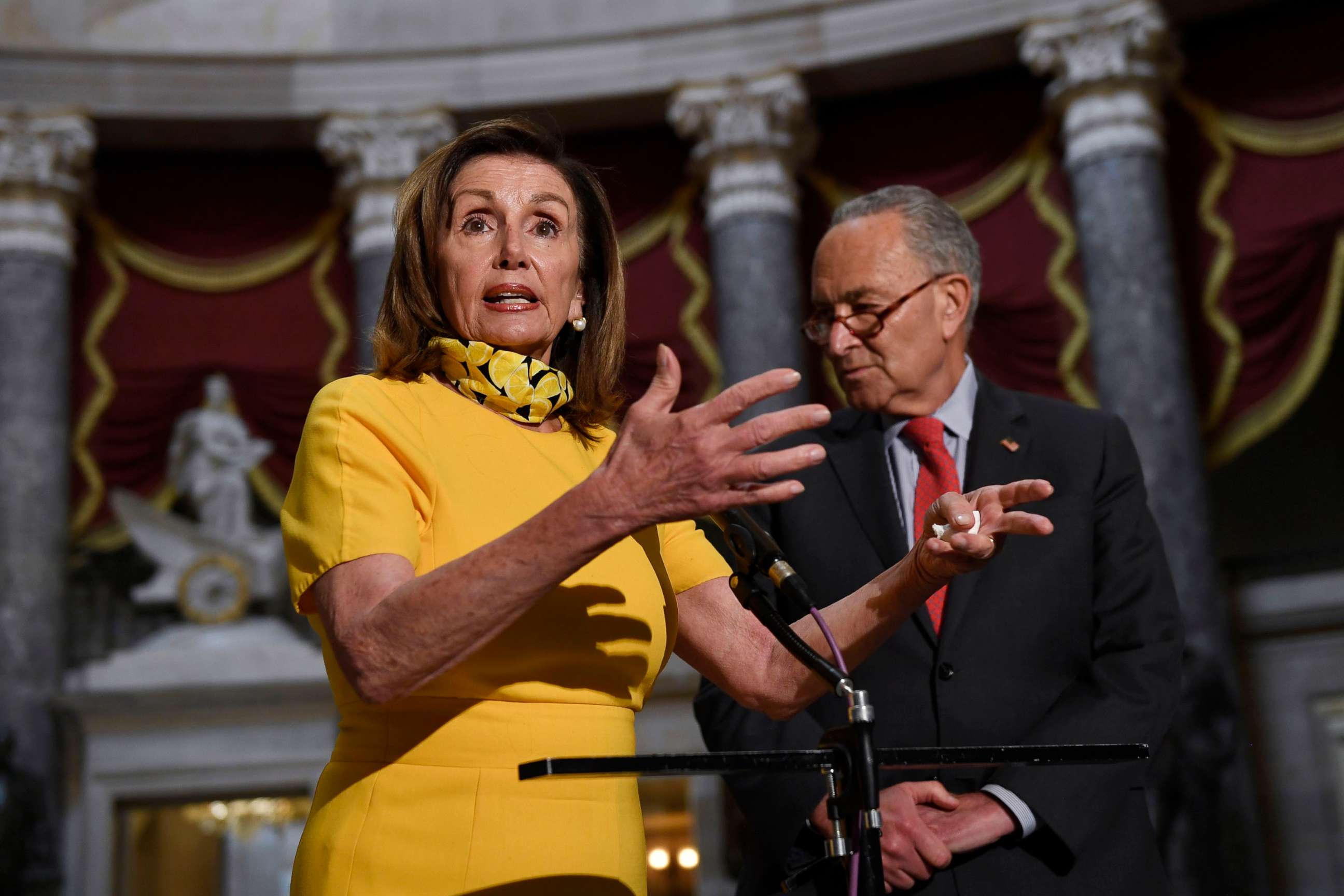 PHOTO: House Speaker Nancy Pelosi speaks as she stands next to Senate Minority Leader Sen. Chuck Schumer on Capitol Hill in Washington, Aug. 3, 2020.