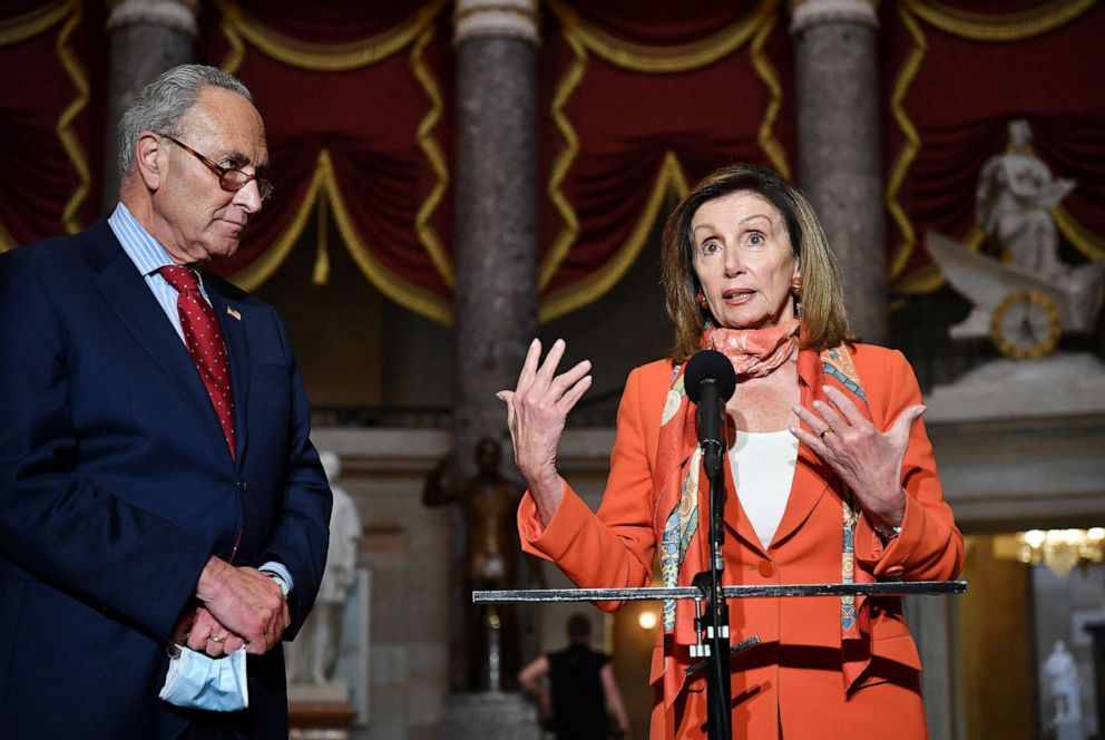 PHOTO: House Speaker Nancy Pelosi and Senate Minority Leader Chuck Schumer speak to reporters at the Capitol in Washington, DC., on Aug. 4, 2020.
