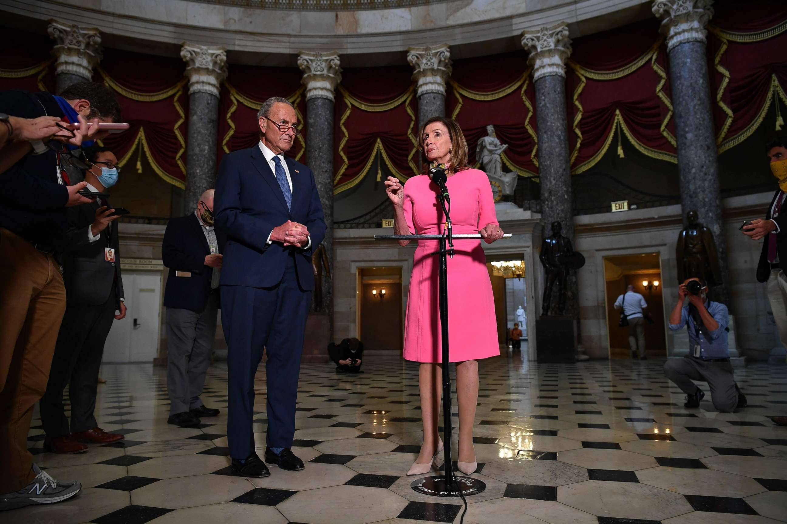 PHOTO: House Speaker Nancy Pelosi speaks, flanked by Senate Minority Leader Chuck Schumer after meeting with the White House Chief of Staff and the US Treasury Secretary on coronavirus relief at the US Capitol in Washington, Aug. 7, 2020.
