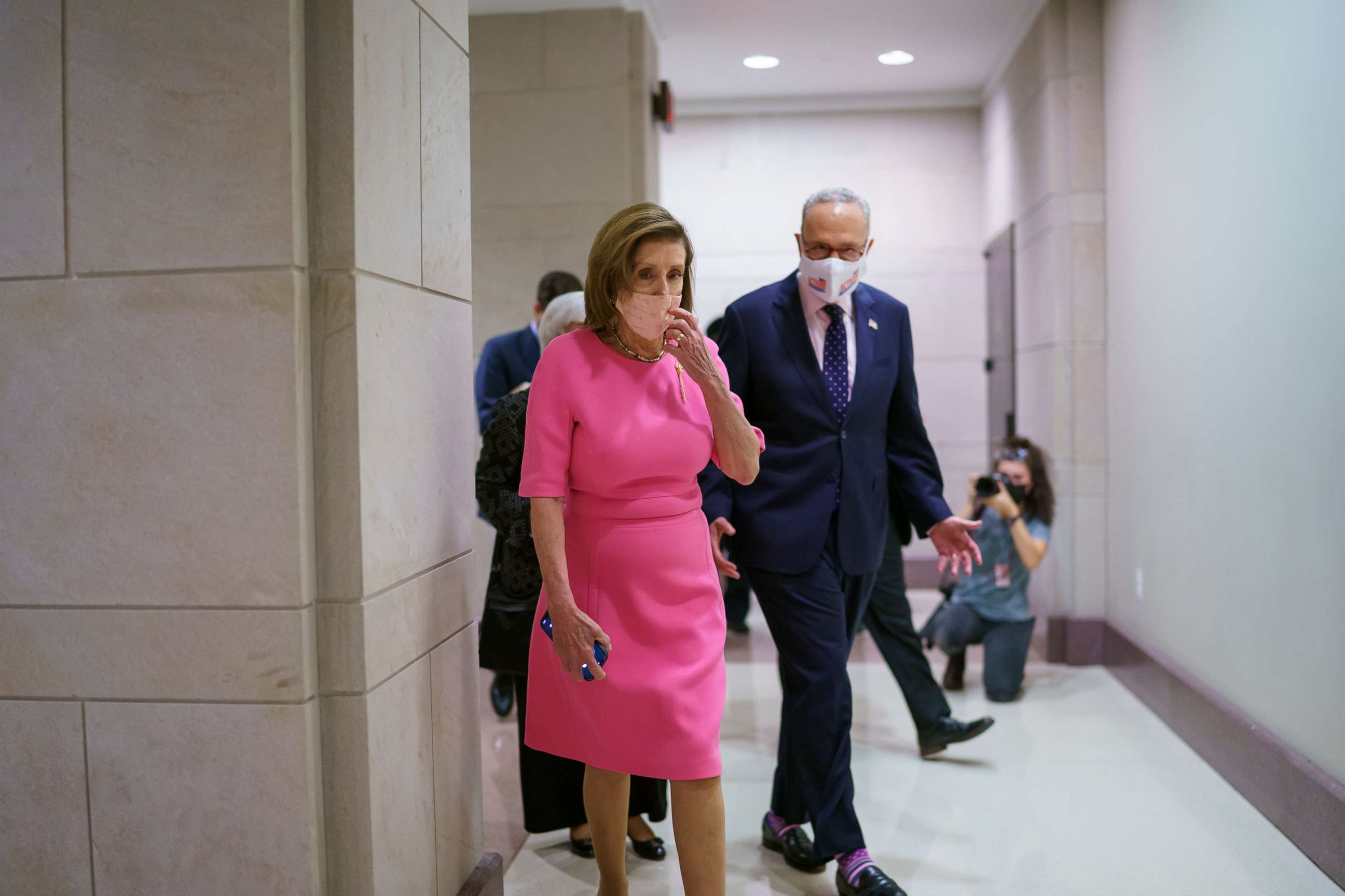Speaker of the House Nancy Pelosi, D-Calif., and Senate Majority Leader Chuck Schumer, D-N.Y., arrive to update reporters on Democratic efforts to pass President Joe Biden's "Build Back Better" agenda at the Capitol in Washington on Sept. 23, 2021. 