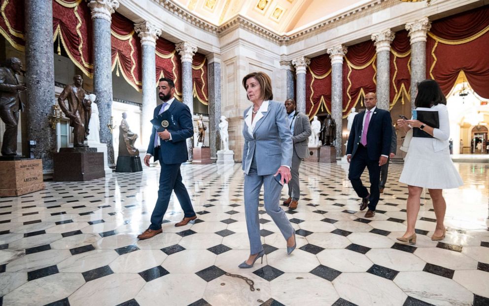 PHOTO: Speaker of the House Nancy Pelosi walks through National Statuary Hall on June 30, 2021.
