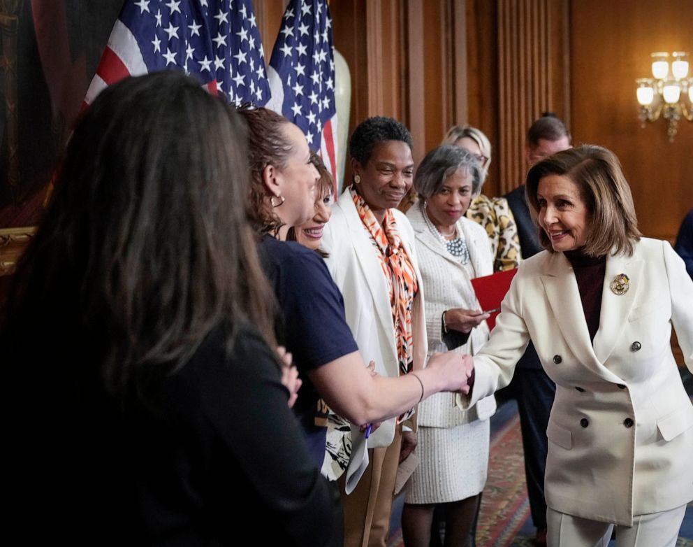 PHOTO: Speaker of the House Nancy Pelosi greets guests after an event to mark Equal Pay Day at the Capitol, March 15, 2022, in Washington, D.C.
