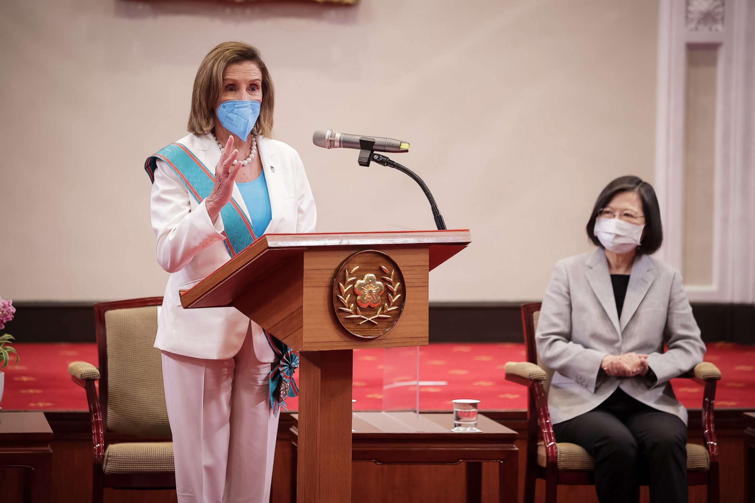 PHOTO: Nancy Pelosi left, speaks after receiving the Order of Propitious Clouds with Special Grand Cordon, Taiwan's highest civilian honor, from Taiwan's President Tsai Ing-wen, right, at the president's office on Aug. 3, 2022 in Taipei, Taiwan.