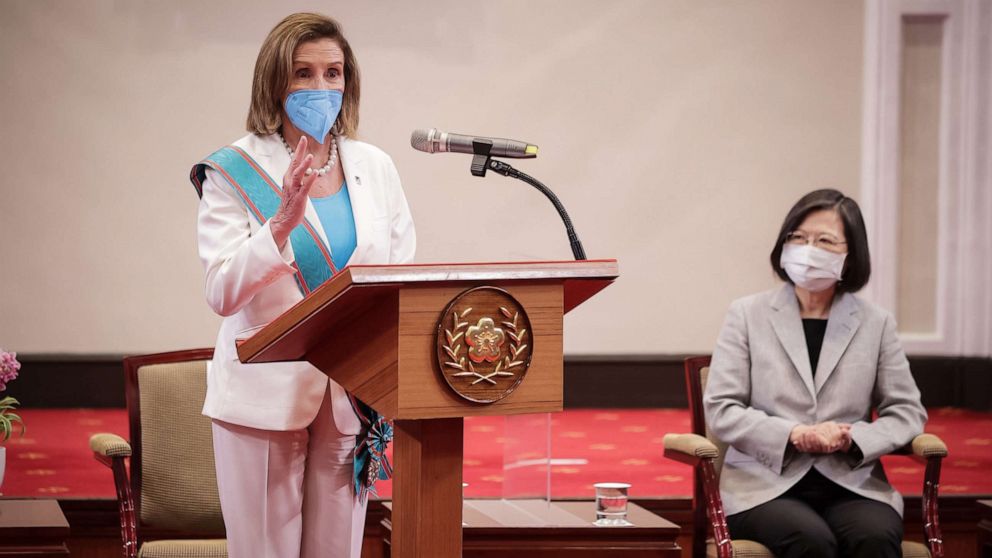 PHOTO: Nancy Pelosi left, speaks after receiving the Order of Propitious Clouds with Special Grand Cordon, Taiwan's highest civilian honor, from Taiwan's President Tsai Ing-wen, right, at the president's office on Aug. 3, 2022 in Taipei, Taiwan.